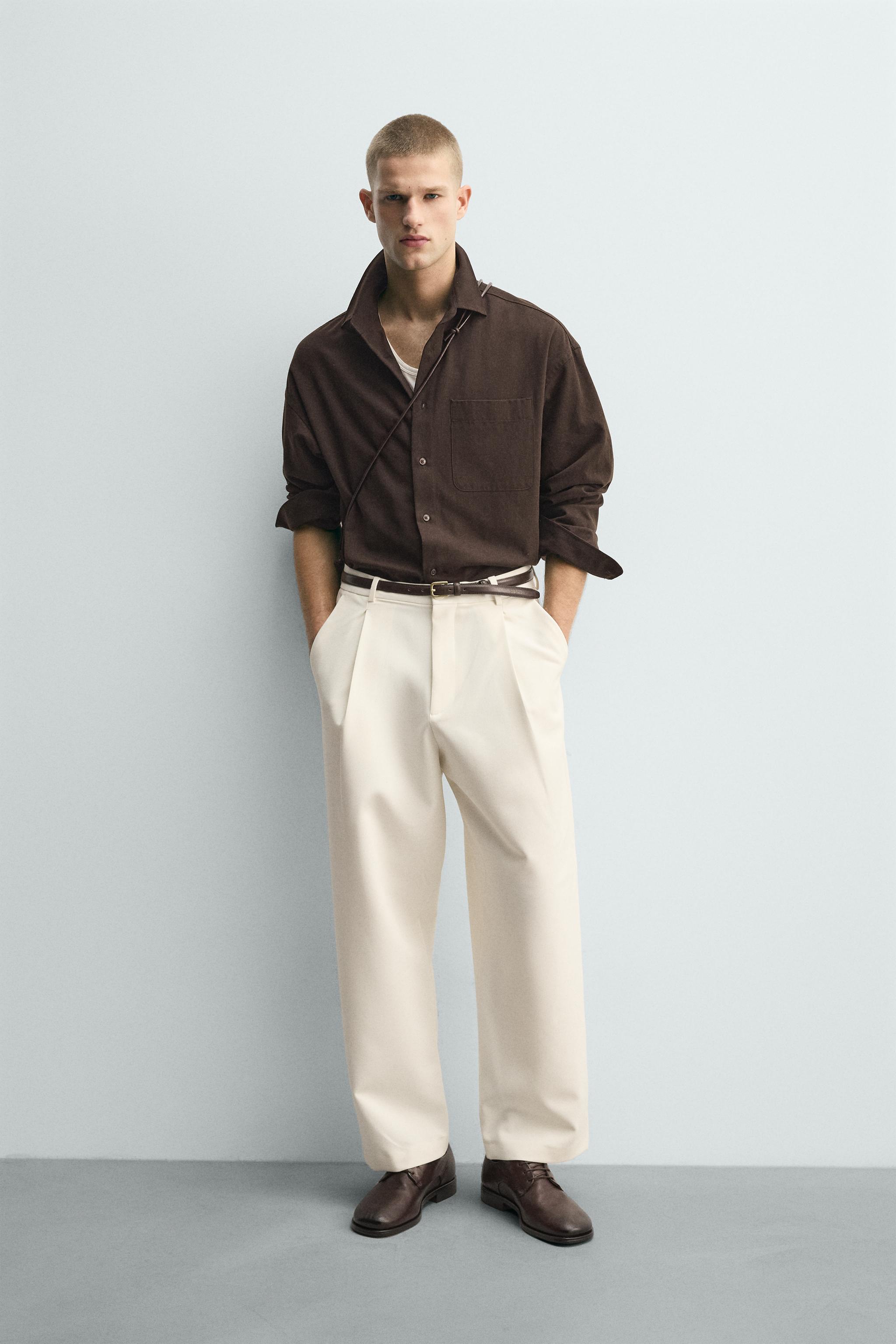 RELAXED FIT PLEATED PANTS
